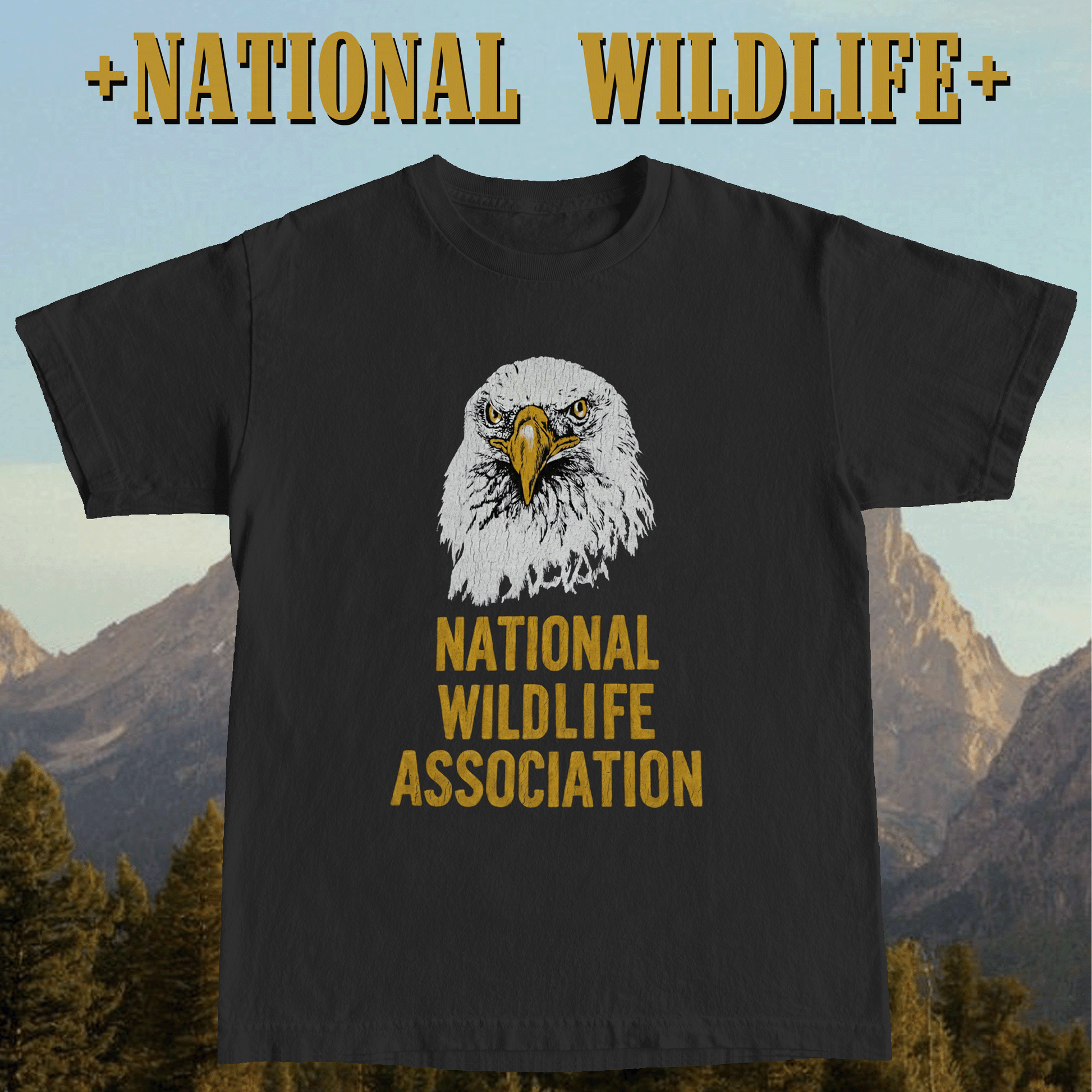Black t-shirt with an eagle graphic and 'National Wildlife Association' text against a mountainous background.