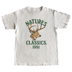White t-shirt with a deer graphic and 'Natures Classics 1991' text on a green background