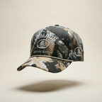 Camouflage baseball cap with 'Macs Nature Supply' branding on a beige background
